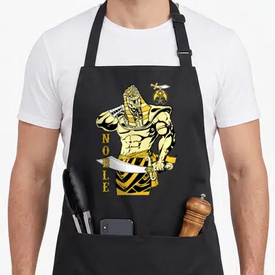 Noble mason apron - Vertical NOBLE text beside a muscular pharaoh holding a sword with an amulet icon — shown on a black cotton canvas apron against a white background