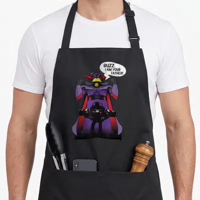 Zurg buzz dog breed aprons - Zurg says Buzz I Am Your Father with Buzz silhouette in purple and red — shown on a black cotton canvas apron against a white background