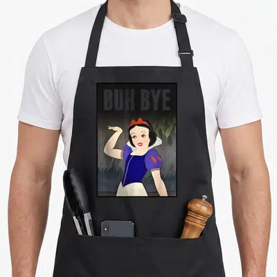 Buh snow white apron - Grey BUH BYE text above waving Snow White in blue yellow dress against dark forest in black frame — shown on a black cotton canvas apron against a white background