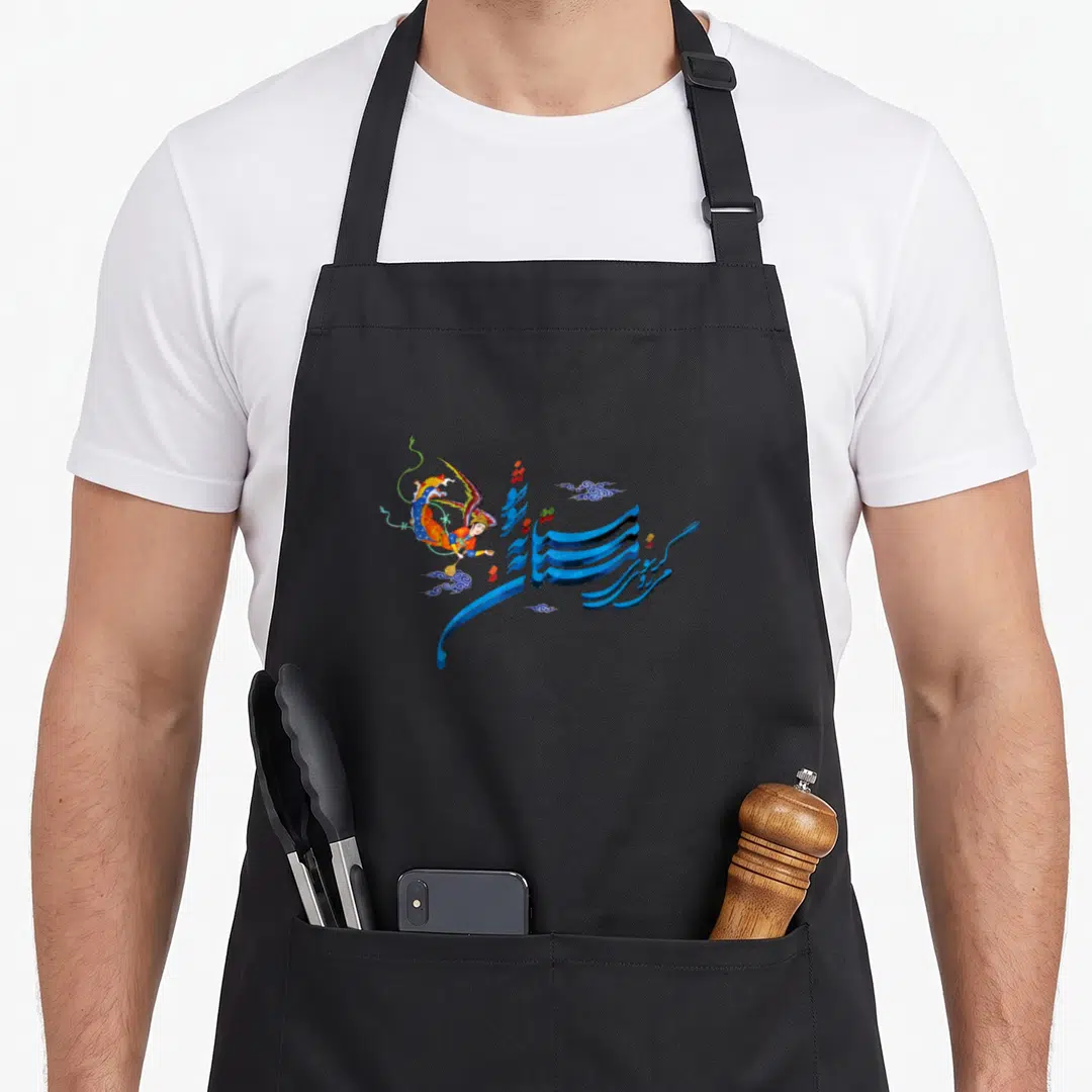 Mastaneh unique apron - Realistic angel in orange blue yellow beside large blue 3D calligraphy with small scattered — shown on a black cotton canvas apron against a white background