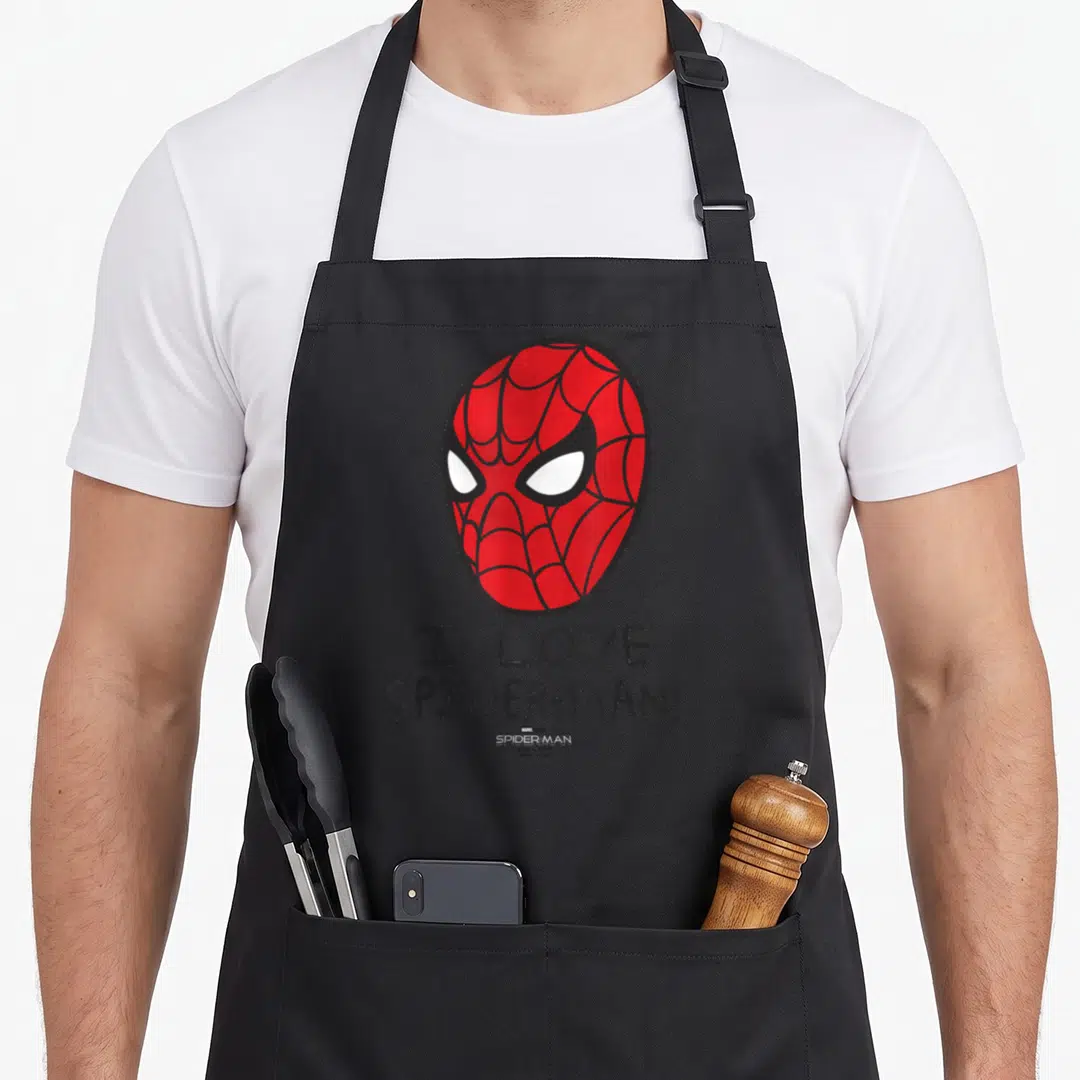 Way poster novelty apron - Red Spider-Man mask above I LOVE SPIDER-MAN text in cartoon style — shown on a black cotton canvas apron against a white background