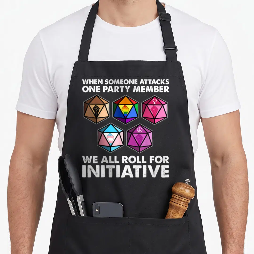 Someone novelty apron - Five 20-sided dice with fists rainbow flag female sign clasped hands peace sign — shown on a black cotton canvas apron against a white background