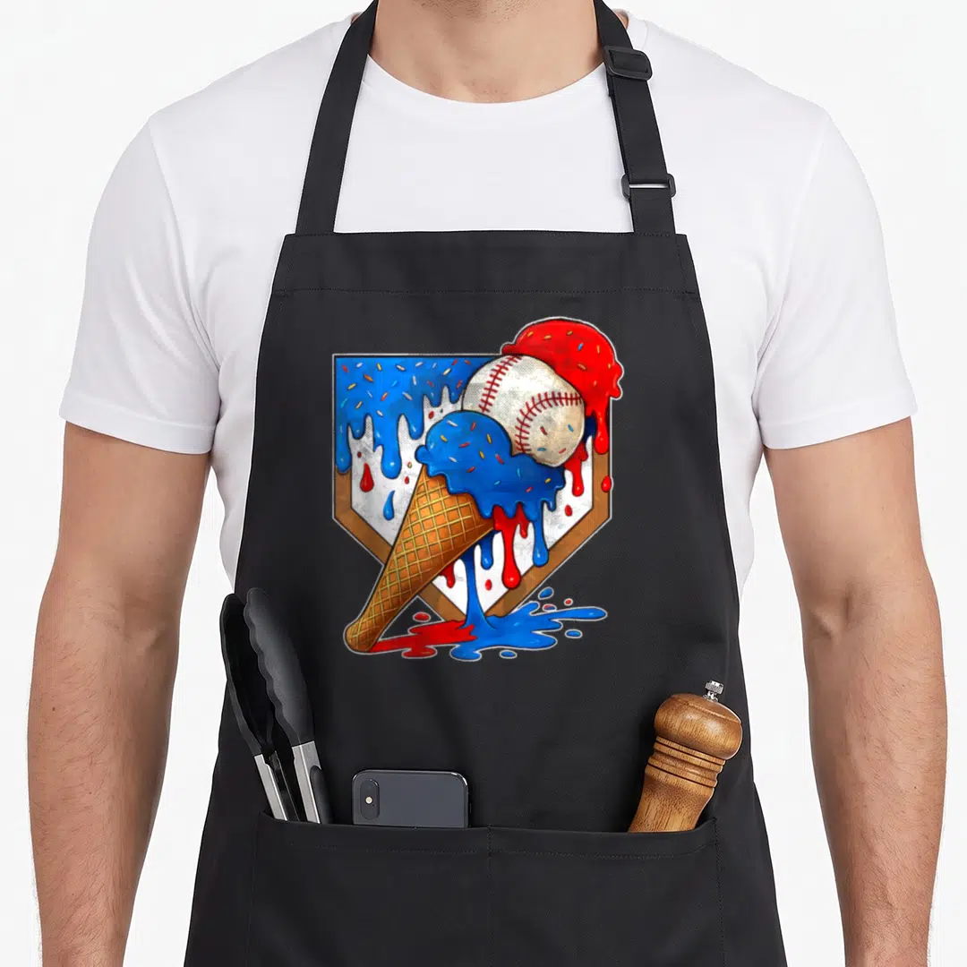 Distressed ice cream apron - Cartoon ice cream cone with baseball and red blue melting drips inside a shield — shown on a black cotton canvas apron against a white background
