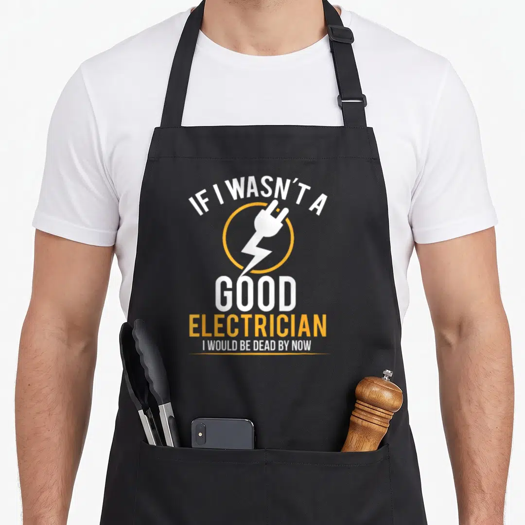 Wasnt electrician apron - White and yellow text reading IF I WASN'T A GOOD ELECTRICIAN surrounded by a plug — shown on a black cotton canvas apron against a white background