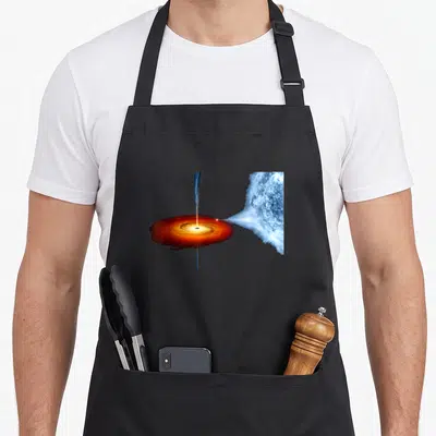 Hole science apron - Black hole with orange red disk and blue jet pulling matter from blue planet — shown on a black cotton canvas apron against a white background