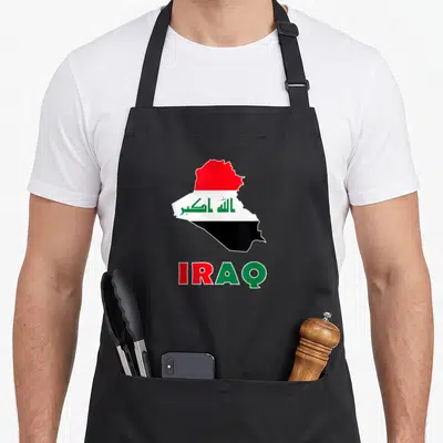 Iraqis iraq apron - Map of Iraq in red white black green with Arabic script and IRAQ text — shown on a black cotton canvas apron against a white background