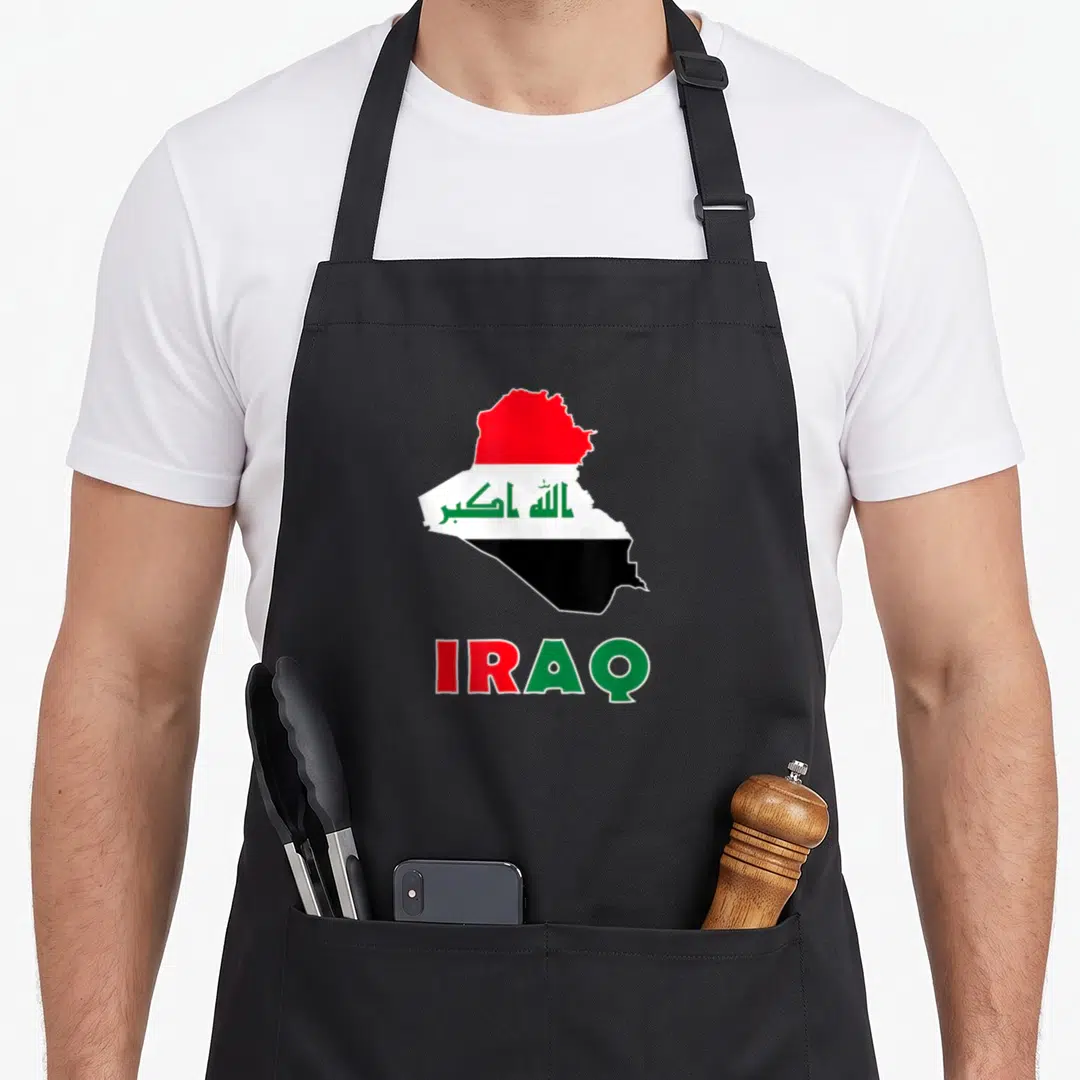 Iraqis iraq apron - Map of Iraq in red white black green with Arabic script and IRAQ text — shown on a black cotton canvas apron against a white background