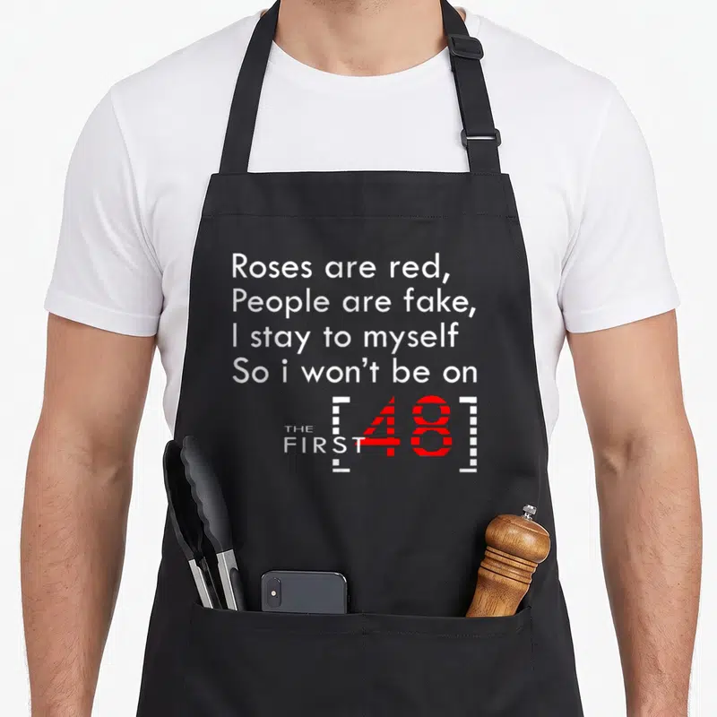 Myself rose apron - Roses are red People are fake typography with red striped 48 logo — shown on a black cotton canvas apron against a white background