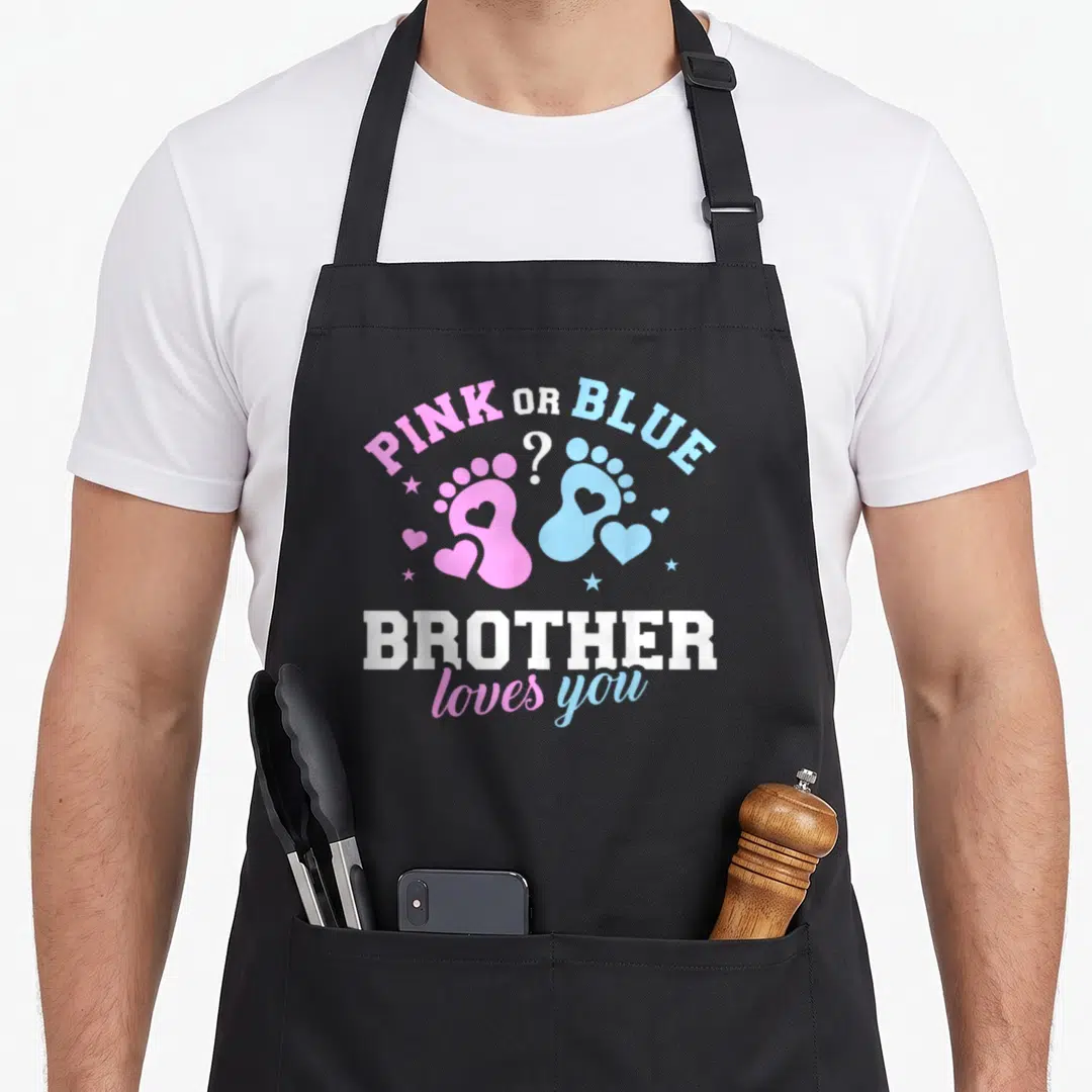 Gender brother love apron - PINK OR BLUE text over pink and blue baby footprints with hearts and BROTHER loves you — shown on a black cotton canvas apron against a white background