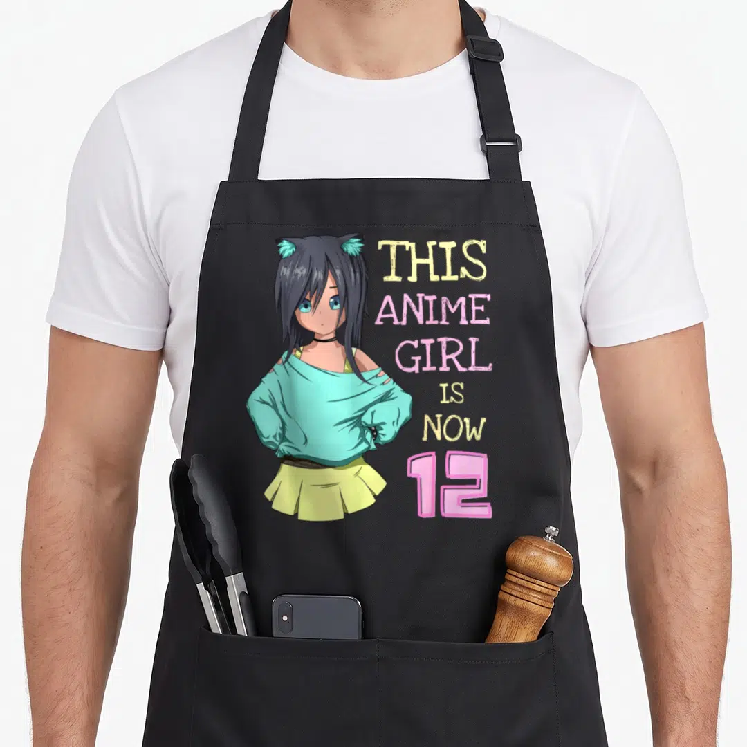 Funny birthday anime mom apron - Anime girl with cat ears and stacked text reading THIS ANIME GIRL IS NOW 12 in teal — shown on a black cotton canvas apron against a white background