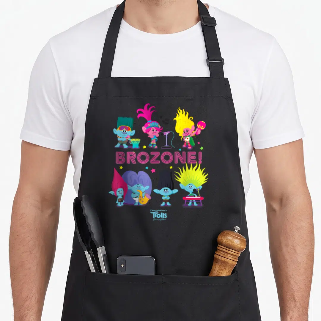 Troll boy family apron - Seven Trolls with instruments surrounding pink BROZONE text on black fabric — shown on a black cotton canvas apron against a white background