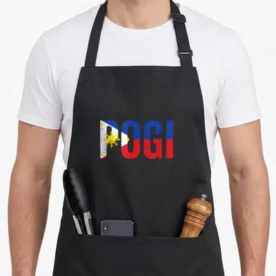 Pogi hilarious aprons - POGI text filled with Philippine flag blue red yellow white sun and stars — shown on a black cotton canvas apron against a white background