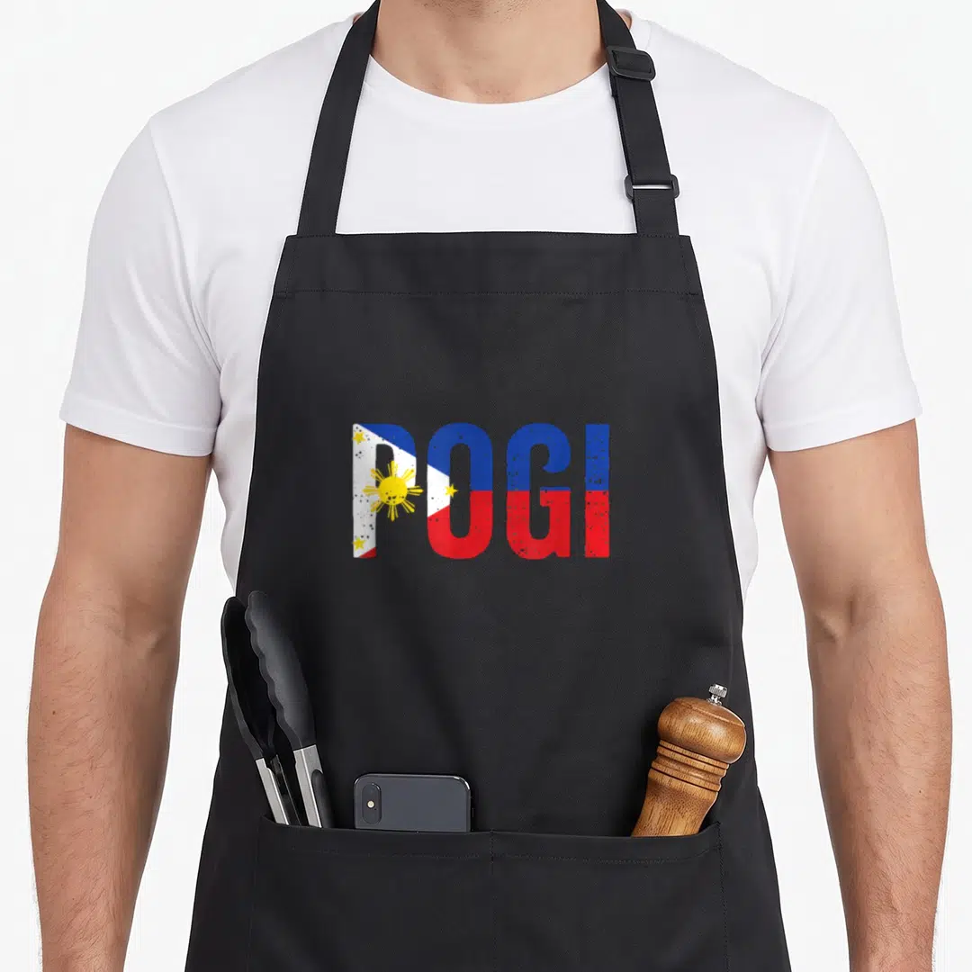 Pogi hilarious aprons - POGI text filled with Philippine flag blue red yellow white sun and stars — shown on a black cotton canvas apron against a white background
