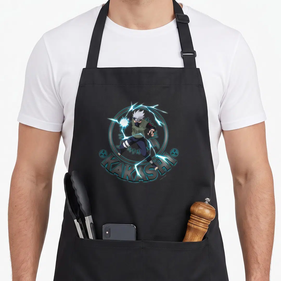 Kakashi general apron - Kakashi character in grey circle with blue lightning bolts and curved text — shown on a black cotton canvas apron against a white background