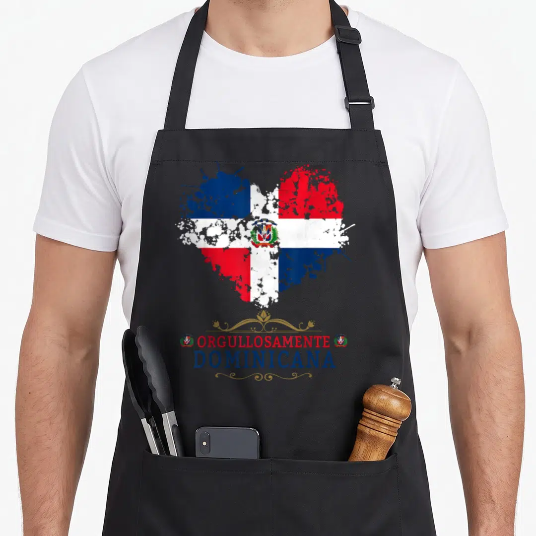 Arm dominican apron - Heart shaped Dominican flag with distressed paint splatter and Orgullosamente Dominicana text — shown on a black cotton canvas apron against a white background