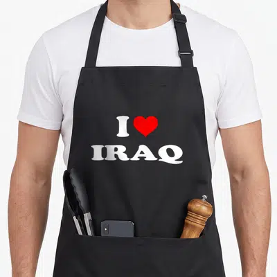 Iraq i love golden apron - White I and IRAQ text with red heart symbol on grey background — shown on a black cotton canvas apron against a white background