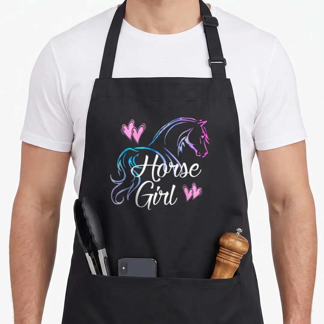 Horse apron for women - Stylized horse head in profile with pink hearts and white script text Horse Girl — shown on a black cotton canvas apron against a white background