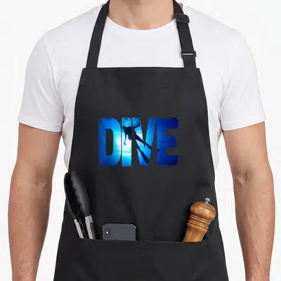 Scuba diving lover apron - DIVE text containing scuba diver silhouette in blue and black — shown on a black cotton canvas apron against a white background