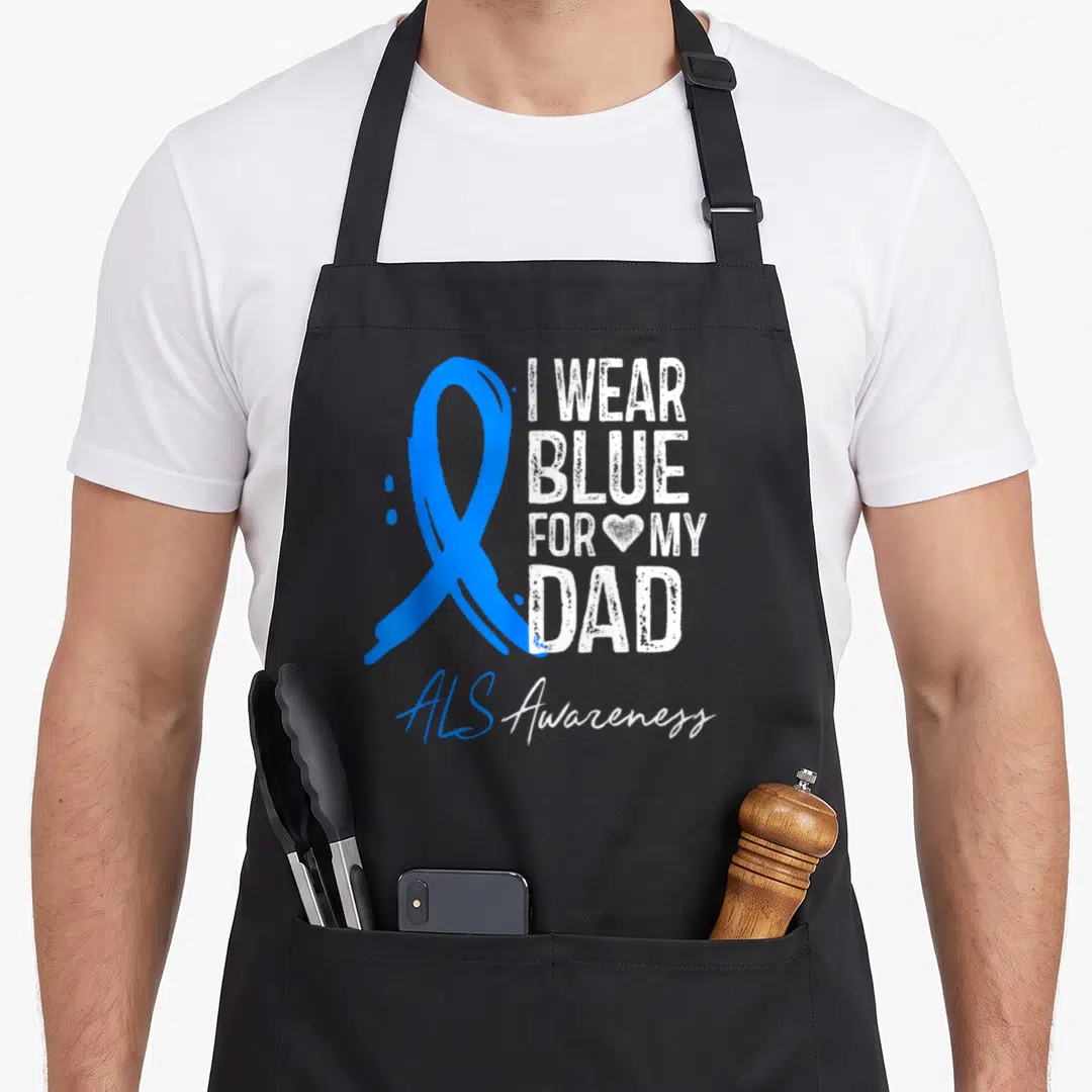 Blue als awareness apron - Blue ribbon next to distressed white text I WEAR BLUE FOR MY DAD ALS Awareness — shown on a black cotton canvas apron against a white background