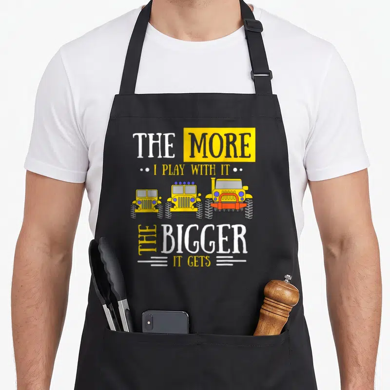 Play owner apron - Three yellow cartoon jeeps increasing in size with white and yellow text — shown on a black cotton canvas apron against a white background