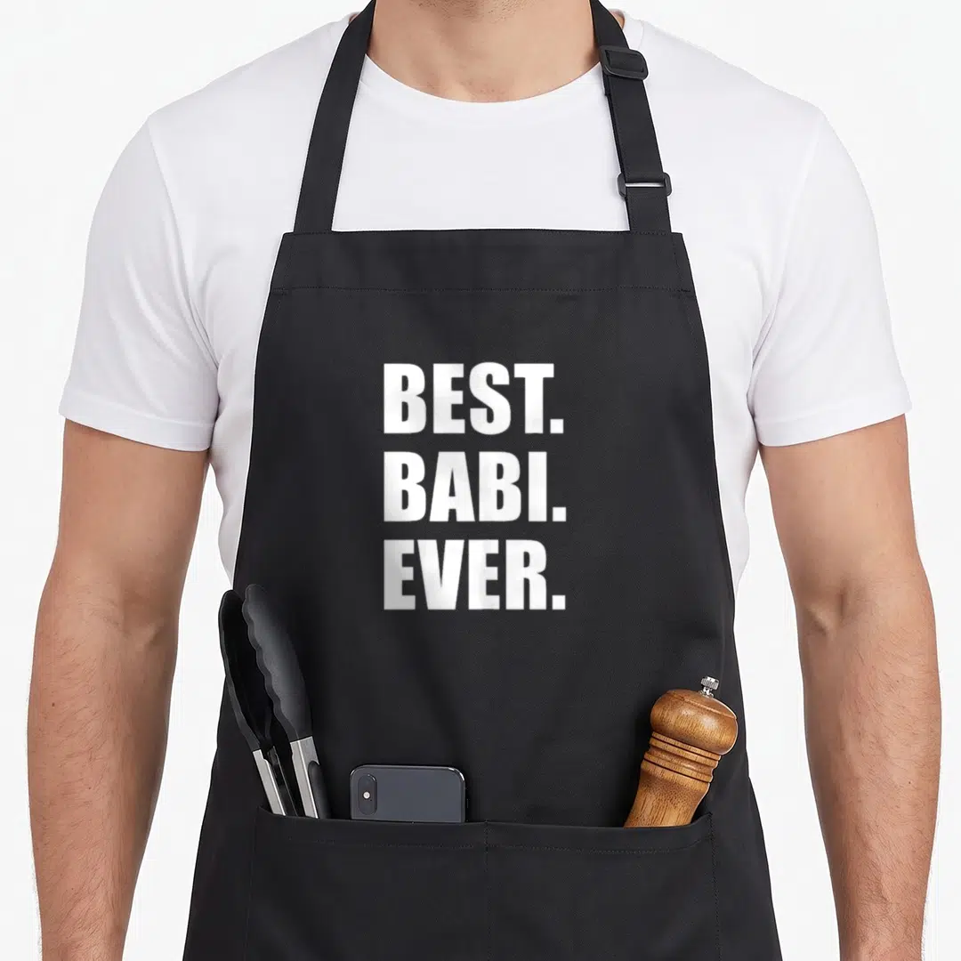 Babi grandmother apron - White stacked text BEST. BABI. EVER. on black bib apron — shown on a black cotton canvas apron against a white background