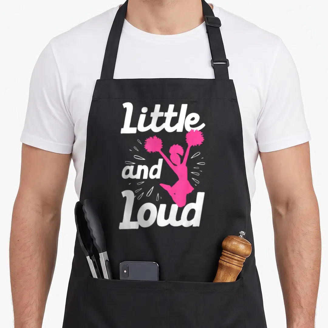 Cheer cheerleader cheerleading accessories stuff apron - Pink cartoon cheerleader jumping between white Little and Loud — shown on a black cotton canvas apron against a white background