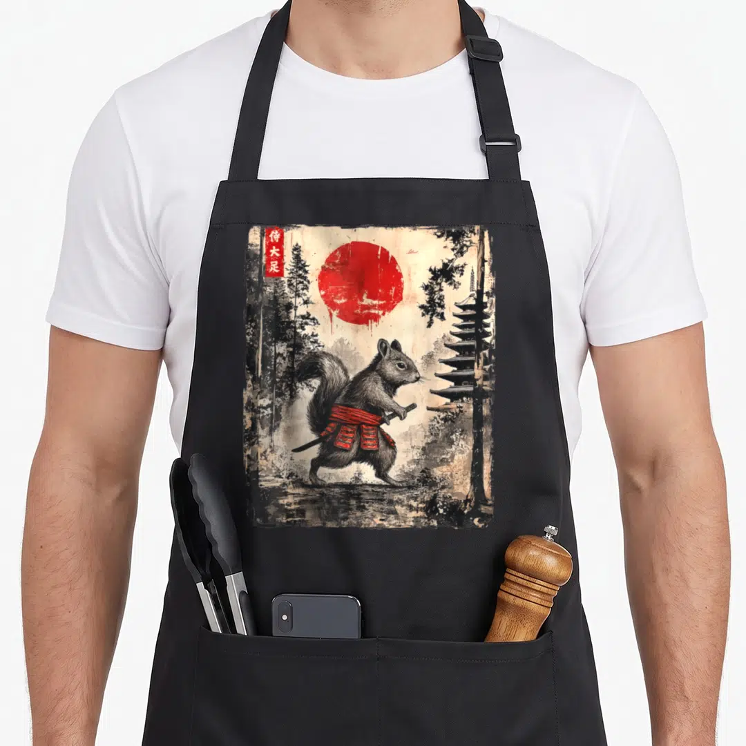 Samurai squirrel aprons - Distressed squirrel in red samurai armor with red sun and pagoda — shown on a black cotton canvas apron against a white background