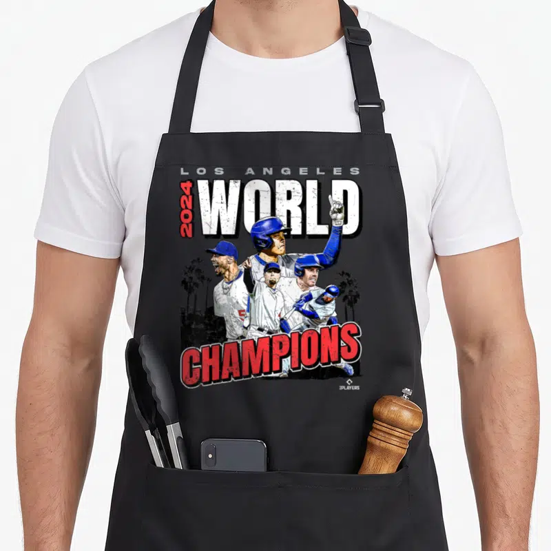 Champion novelty apron - Four baseball players overlapping 2024 WORLD CHAMPIONS text with palm trees in distressed blue — shown on a black cotton canvas apron against a white background
