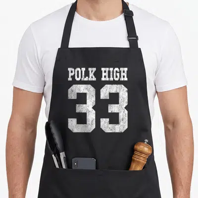 Polk football apron - White distressed text reading POLK HIGH above the number 33 — shown on a black cotton canvas apron against a white background