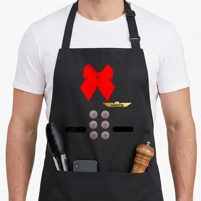 Flight uniform apron - Red bow above gold HOSTIE wing with six silver glittery buttons and black bars — shown on a black cotton canvas apron against a white background