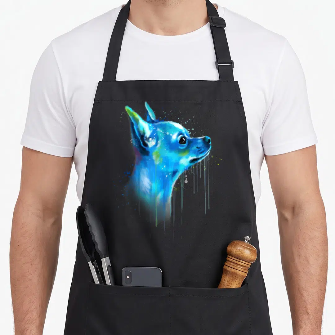 Chihuahua pet chinchilla apron - Blue watercolor dog profile with cyan, purple, and green paint splatters and drips — shown on a black cotton canvas apron against a white background