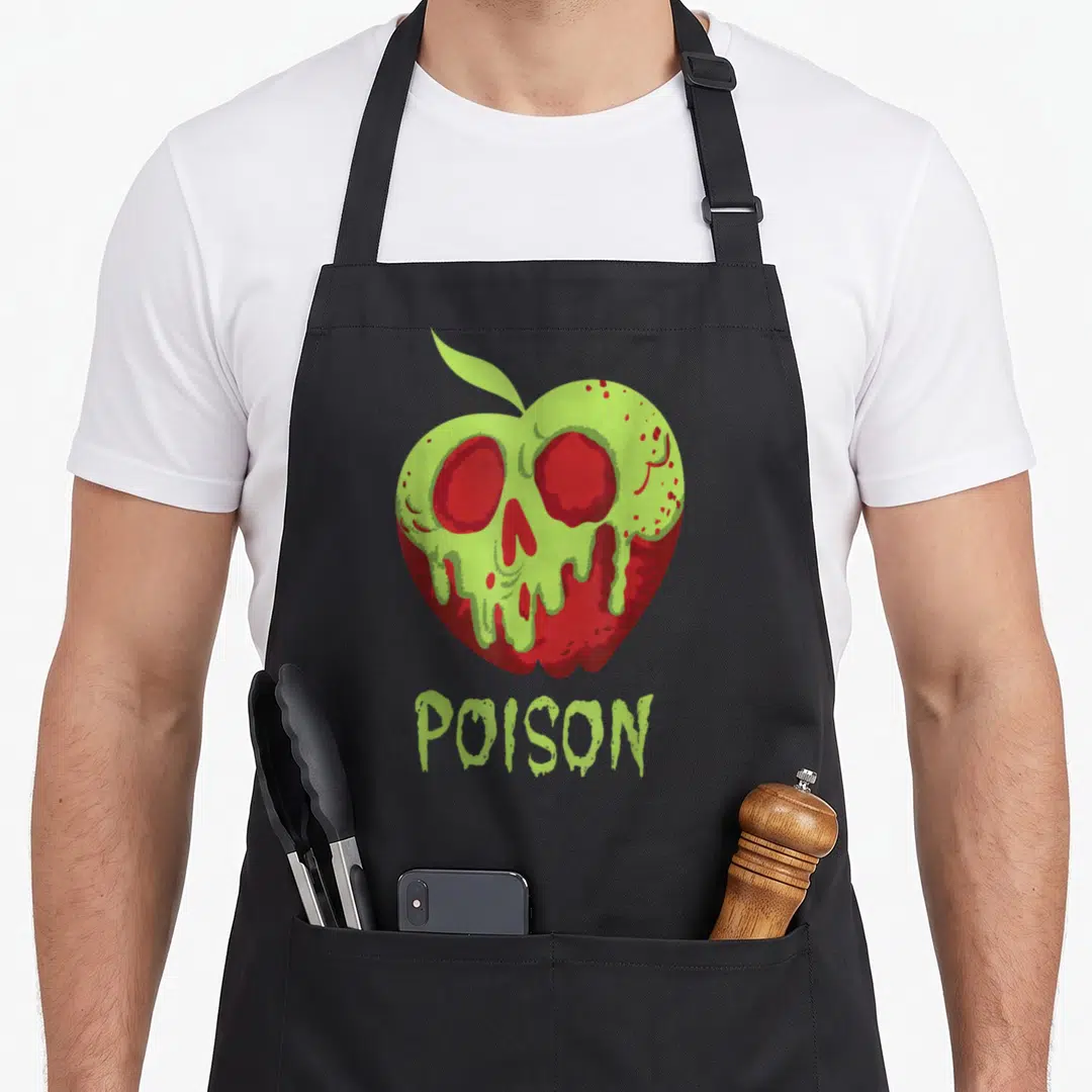 Wreck apple apron - Red apple with melting lime green skull and POISON text below — shown on a black cotton canvas apron against a white background