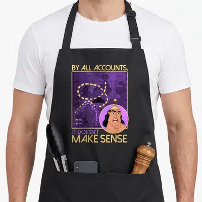 Groove kronk apron - Kuzco cartoon portrait overlaps purple stamp illustration with yellow and purple text — shown on a black cotton canvas apron against a white background