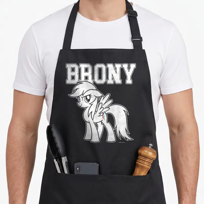 Brony magic apron - Distressed BRONY text above a white winged pony with a small flank mark on grey background — shown on a black cotton canvas apron against a white background