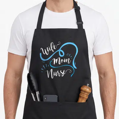 Lpn white nurse apron - Stacked Wife Mom Nurse text with blue heart outline and white script — shown on a black cotton canvas apron against a white background