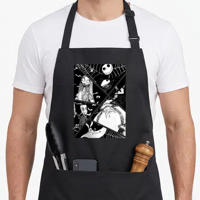 Jack santa apron - Black and white line art collage of Jack Skellington, Sally, Oogie Boogie, Mayor, and Zero separated — shown on a black cotton canvas apron against a white background