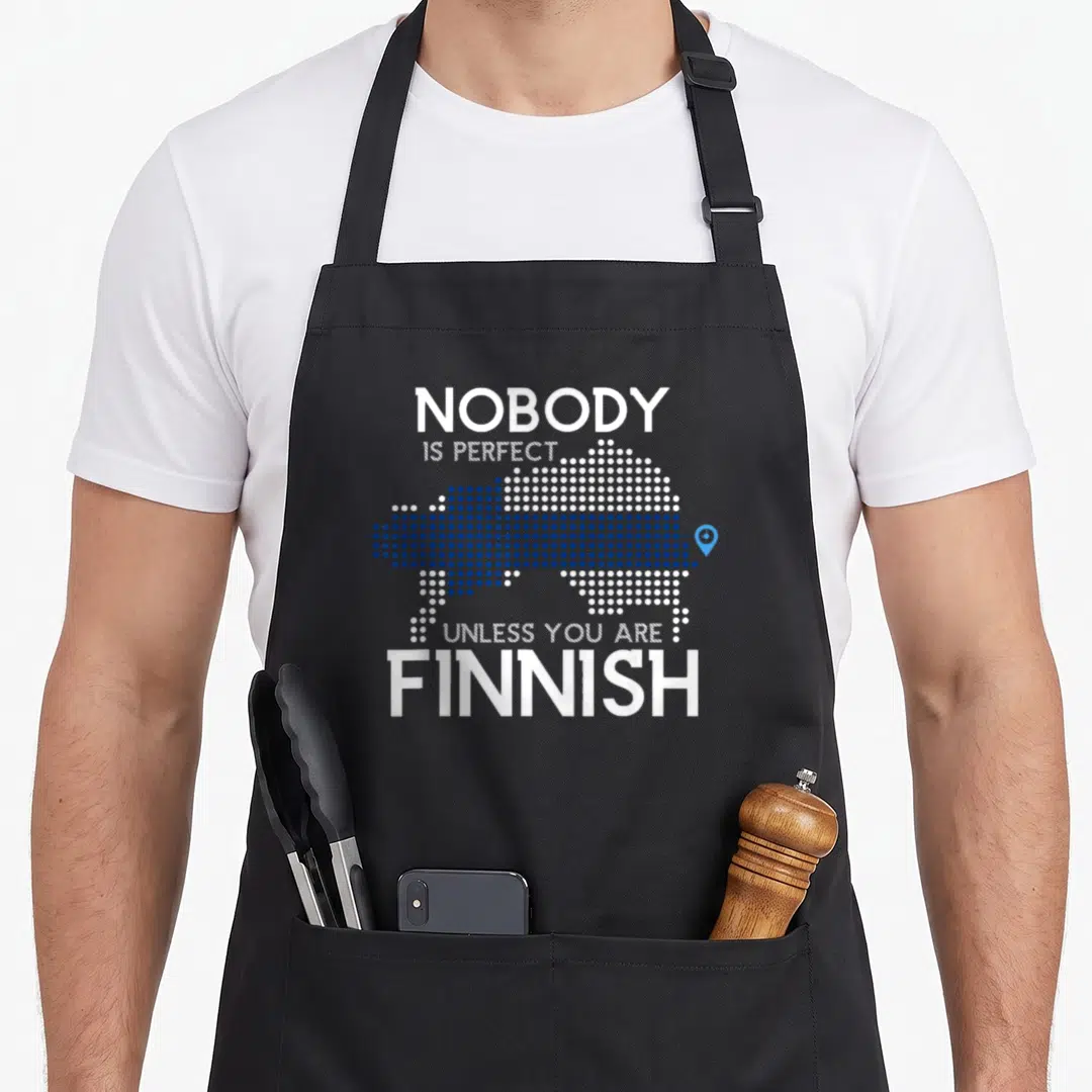 Finnish scandinavian aprons - Dotted map of Finland in white and blue with stacked text nobody is perfect unless you — shown on a black cotton canvas apron against a white background