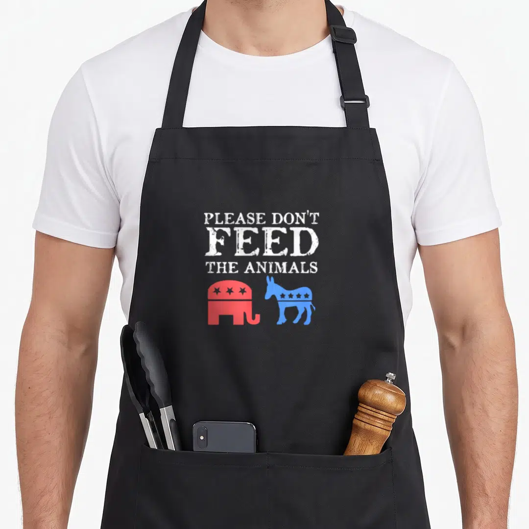Feed animal apron - Red elephant and blue donkey below white distressed text — shown on a black cotton canvas apron against a white background