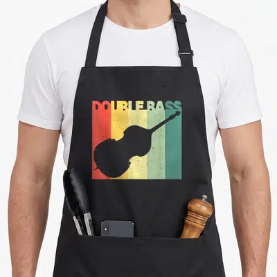 Upright instrument double apron - Retro double bass silhouette over red yellow green and grey vertical stripes — shown on a black cotton canvas apron against a white background