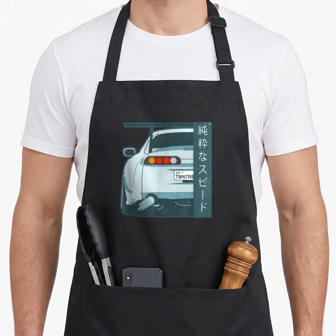 Pure distressed apron - Rear of light blue car with vertical kanji banner and TWNTRE license plate — shown on a black cotton canvas apron against a white background