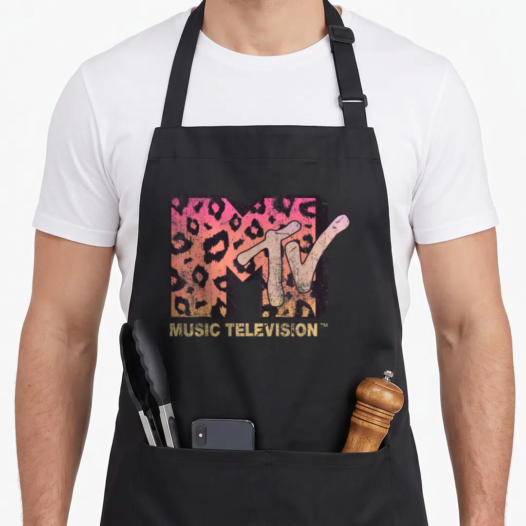 Mtv leopard print apron - Distressed MTV logo with pink orange and yellow leopard print pattern and MUSIC TELEVISION — shown on a black cotton canvas apron against a white background