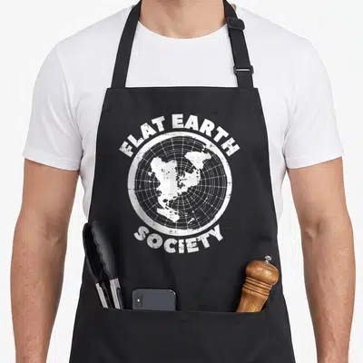 Society conspiracy earther apron - White distressed circular flat earth map with arched text reading FLAT EARTH SOCIETY — shown on a black cotton canvas apron against a white background