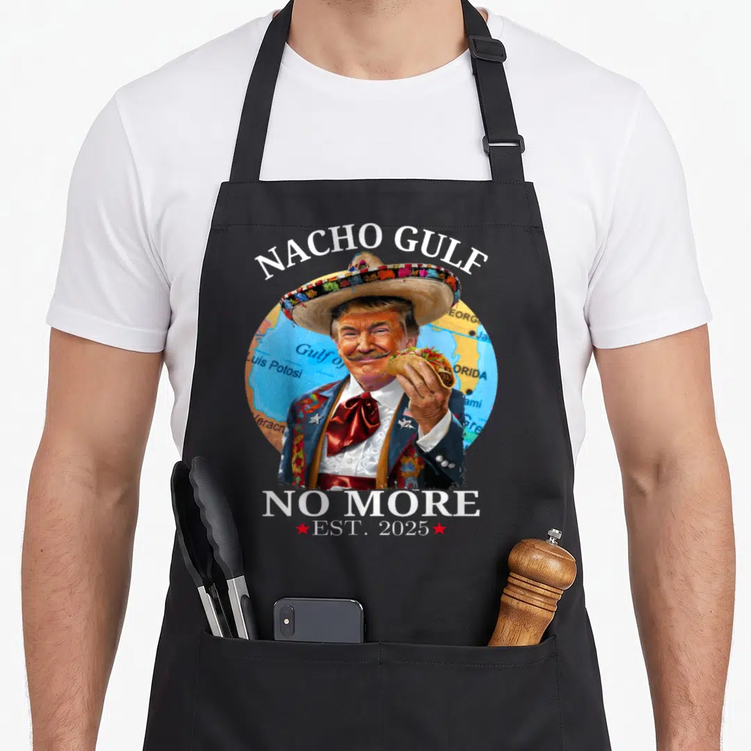 Nacho president humor apron - Portrait of man in sombrero holding taco with text Nacho Gulf No More Est 2025 — shown on a black cotton canvas apron against a white background