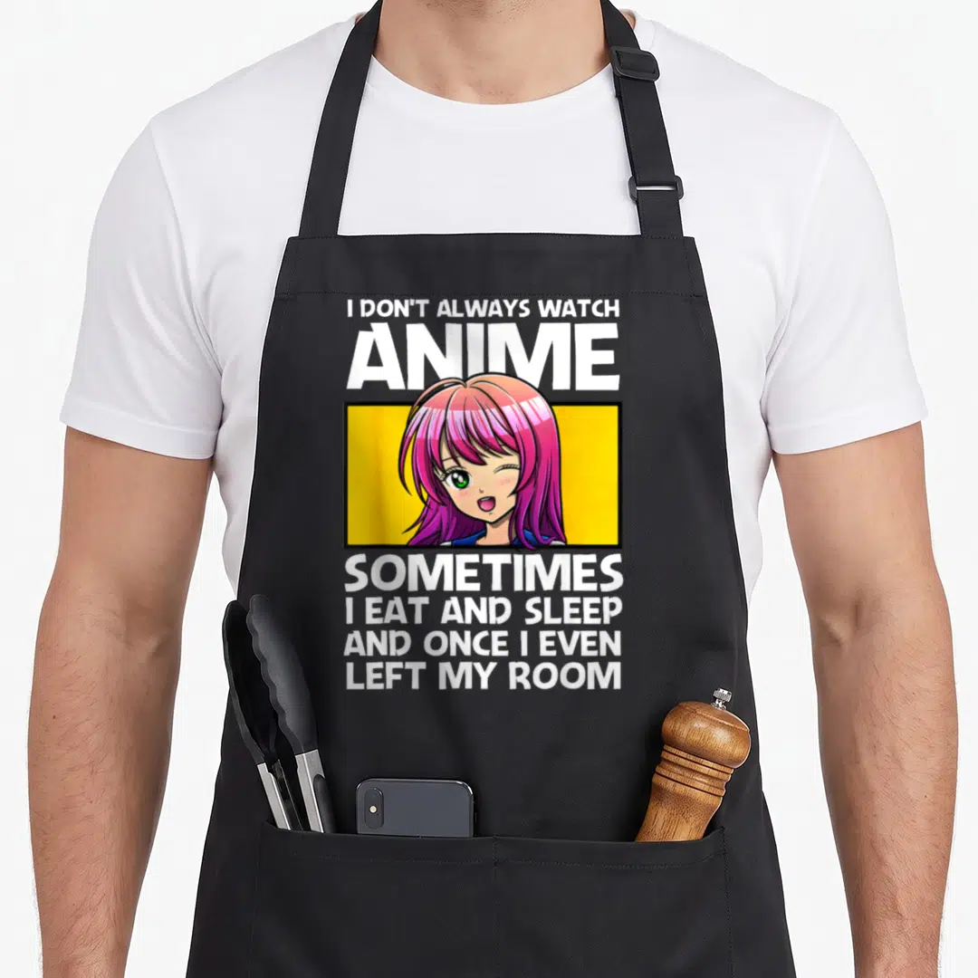 Cute anime apron - Anime girl in yellow box with white text about watching anime and leaving the room — shown on a black cotton canvas apron against a white background