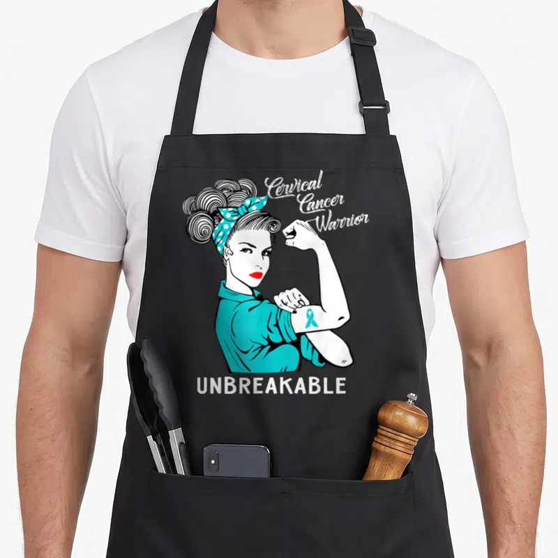 Cervical cancer apron - Rosie the Riveter flexing arm with teal ribbon and Cervical Cancer Warrior UNBREAKABLE text — shown on a black cotton canvas apron against a white background