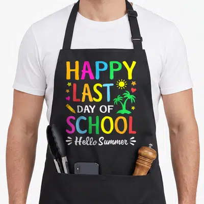 School hello teacher apron - Stacked Happy Last Day of School text with palm tree, sun, pencil, and hearts in yellow — shown on a black cotton canvas apron against a white background