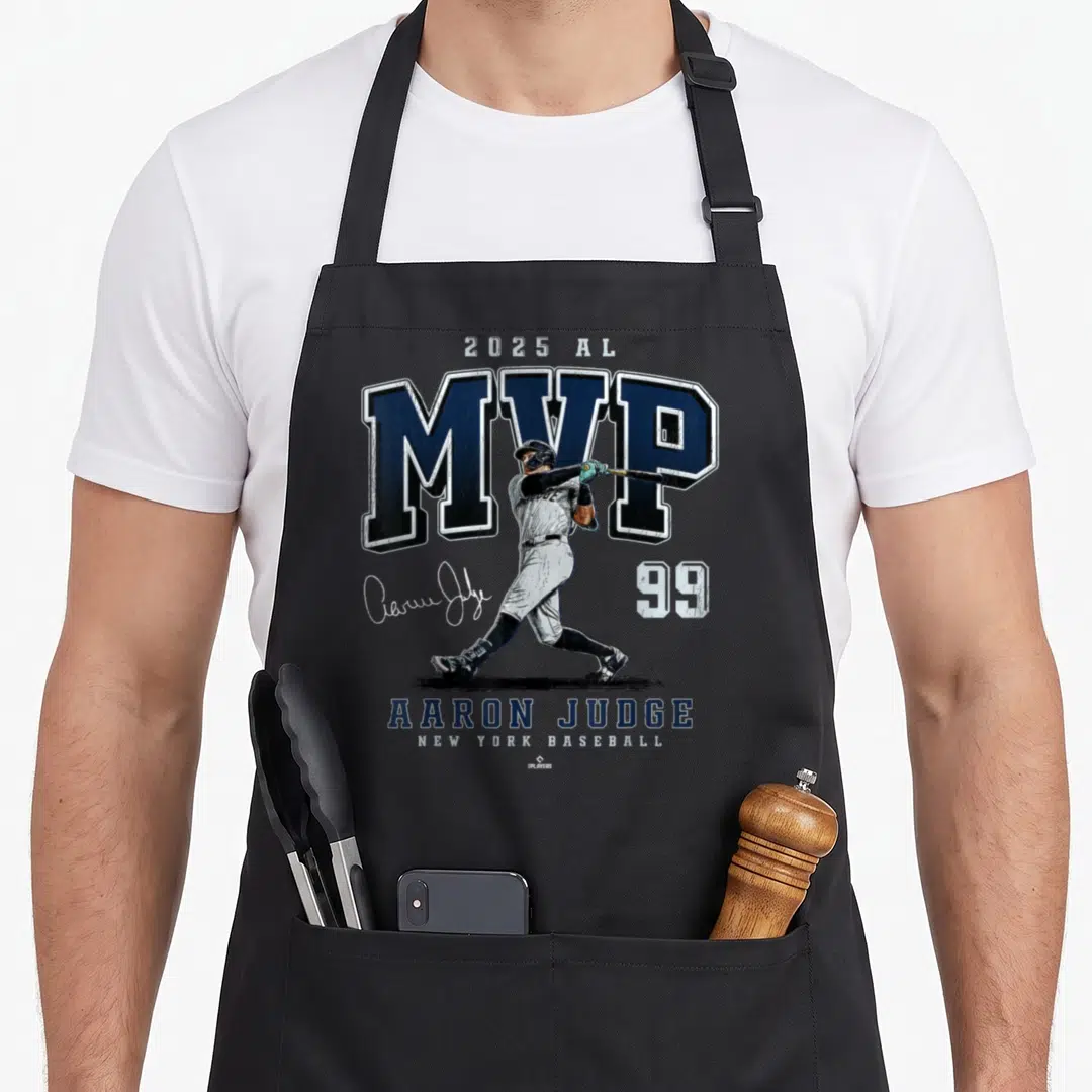 Mvp new york apron - Aaron Judge swinging bat with 2025 AL MVP text and number 99 in navy and grey — shown on a black cotton canvas apron against a white background