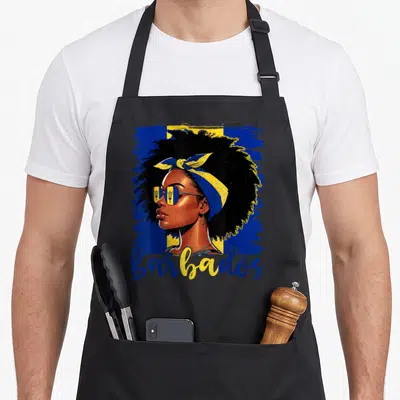 Bajan barbadian apron - Woman profile with afro and headwrap in blue yellow flag colors Barbados script — shown on a black cotton canvas apron against a white background