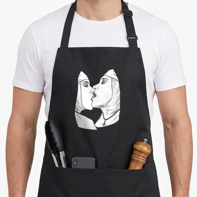 Hot gear v neck apron - Two mummies kissing in white line-art, one wearing cross necklace — shown on a black cotton canvas apron against a white background