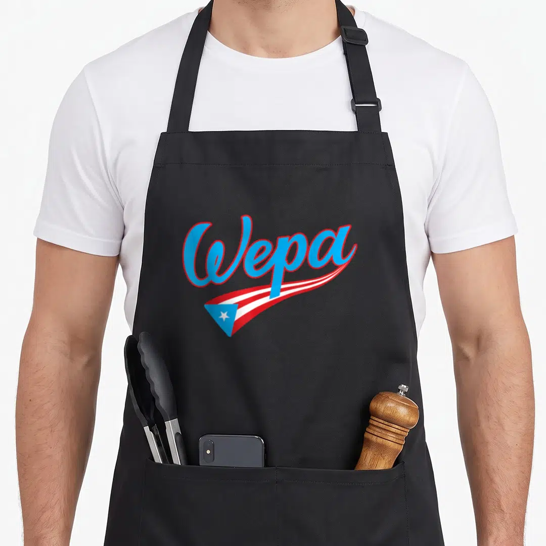 Wepa puerto apron - Blue script Wepa text above red and white waving flag with blue triangle and white star — shown on a black cotton canvas apron against a white background